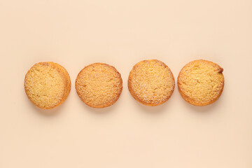Sweet cookies on beige background