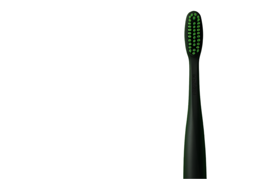 Dark green toothbrush head against black background.  Close-up, minimalist