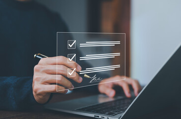Electronic signature Businessman signs electronic document on digital document on page Electronic...