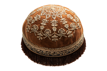 Closed Torah and a kippah also called a yamaka isolated on transparent background
