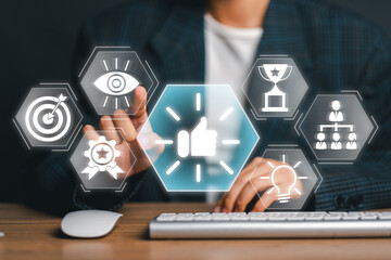 Business professional interacting with digital icons symbolizing encouragement, success, and innovation in a contemporary workspace.