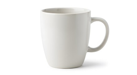 Fototapeta premium A simple white ceramic mug with a handle sitting on a plain white surface in a studio setting