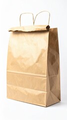 A crumpled brown paper bag sits on a clean white background, showcasing its textured surface and natural earthy tones, perfect for eco-friendly packaging.