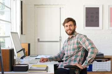Portrait, business and man in office, computer and creativity for project, graphic designer and...