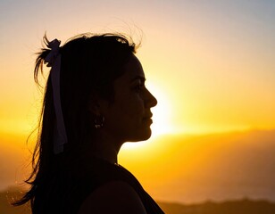 A woman with flowing, long hair cascading down her shoulders, standing in a sunlit park, wearing a casual, stylish outfit and a warm smile.