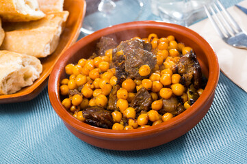Tasty beef stew with chickpeas closeup. High quality photo