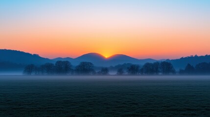 Fototapeta premium Serene Sunrise over Misty Hills and Trees in Pastoral Landscape