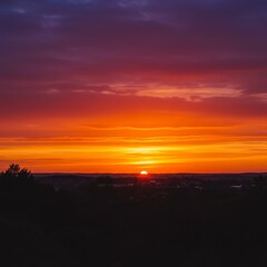 Vibrant Sunset Landscape with Orange and Purple Hues