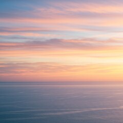 Obraz premium Pastel Sunset Over Calm Ocean