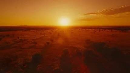 Gardinen A breathtaking aerial view of a desert landscape at sunset. © Berkah