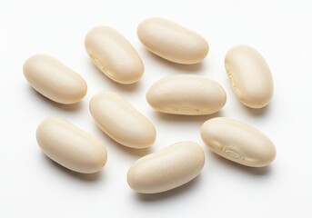 Pile of cannellini beans or white kidney beans on a white background
