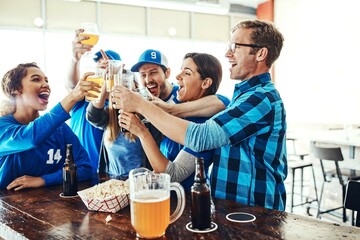 Sports, celebration and friends toast in pub for support, success and cheers with baseball match or...