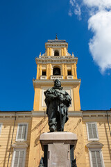 Monument statue historical figure building architecture landmark travel destination European city public art sculpture clear sky.