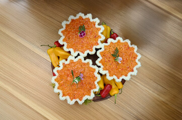pepper tart, citrus fruit tart, orange tart decorated with edible flowers, haute cuisine, French cuisine