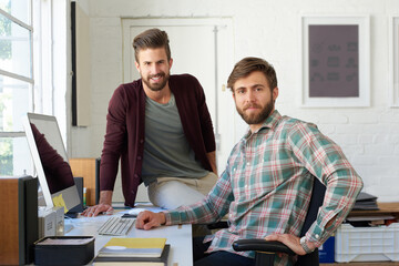 Portrait, business and men on computer in office for research, planning and ideas as web designer...