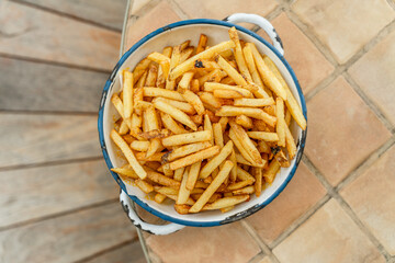 Bowl Of Fries In Rustic Dish