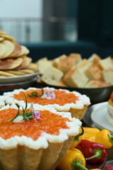 pepper tart, citrus fruit tart, orange tart decorated with edible flowers, haute cuisine, French cuisine