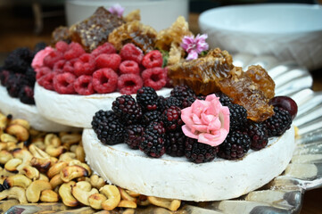 charcuterie, brie cheese, brie cheese with fruits and nuts, cold cuts, cheese and fruit board, honeycomb, cold cuts, cheese and fruit board, appetizer,charcuterie board,meat and cheese platter