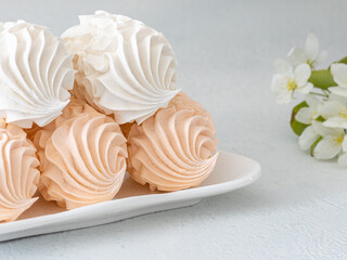 Assorted marshmallows for breakfast with a cup of fragrant coffee