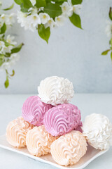 Assorted marshmallows for breakfast with a cup of fragrant coffee