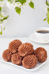 Coffee marshmallows for breakfast with a cup of fragrant coffee