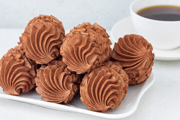 Coffee marshmallows for breakfast with a cup of fragrant coffee