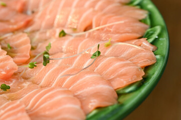 fresh salmon fillet, chinese food in a restaurant, food in a restaurant, buffet style food, fresh salmon steak, raw salmon steak, raw salmon on a plate, salmon, raw fish, food on the table
