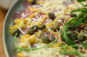 close up of carpaccio, carpaccio, raw food, beef carpaccio, table with food
