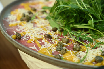 close up of carpaccio, carpaccio, raw food, beef carpaccio, table with food
