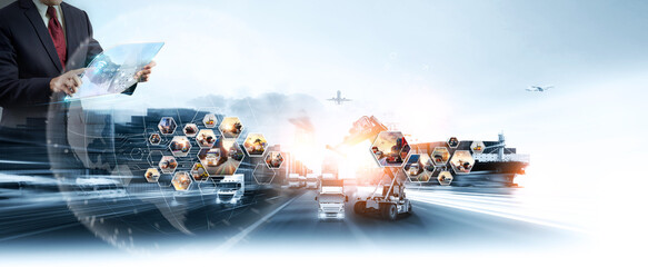Smart technology logistics concept,  Businessman touching virtual screen world map of Global logistics network distribution, Air cargo trucking, Rail transportation and maritime shipping