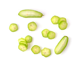 belimbing wuluh. Averrhoa bilimbi fruits or Belimbing slice , cut in half on a white background