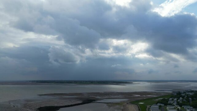Beach and Ocean Sea Side at Point Clear Village in Civil Parish of Saint Osyth, County of Essex, England, United Kingdom During Windy and Cloudy Day