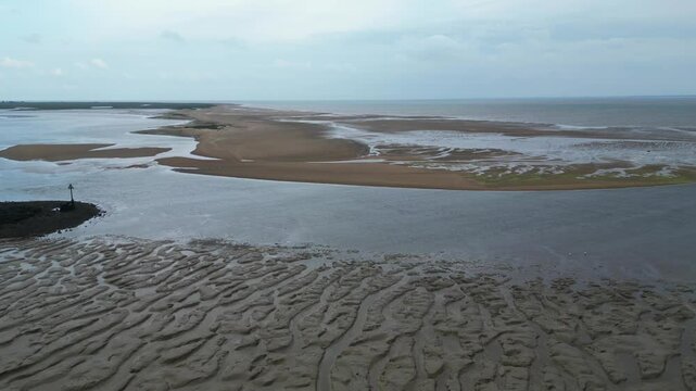 Beach and Ocean Sea Side at Point Clear Village in Civil Parish of Saint Osyth, County of Essex, England, United Kingdom During Windy and Cloudy Day