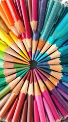 Vibrant Rainbow of Colored Pencils Arranged in a Circular Pattern for Artistic Expression and Creativity