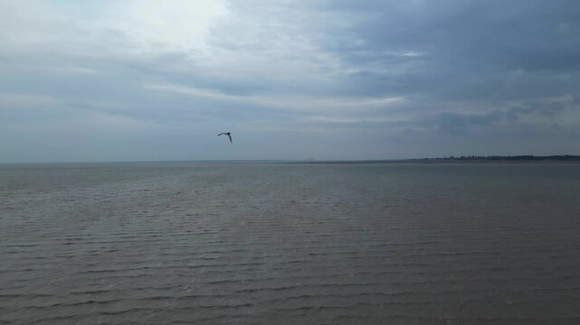 Beach and Ocean Sea Side at Point Clear Village in Civil Parish of Saint Osyth, County of Essex, England, United Kingdom During Windy and Cloudy Day