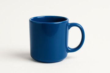 A vibrant blue coffee mug resting on a light surface, perfect for showcasing beverages. Ideal for branding, lifestyle, and product photography with a modern touch.
