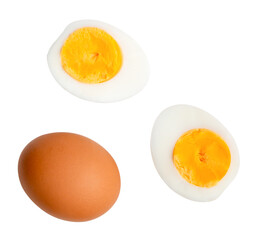 Top view set of raw chicken egg and cooked or boiled egg with egg yolk in two halves isolated with...