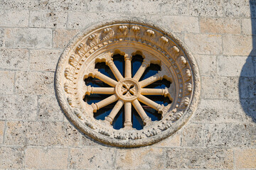 Rose window of the church of Our Lady of the Rocks (Gospa od Škrpjela) on an artificial island in the Bay of Kotor off the coast of Perast, Montenegro