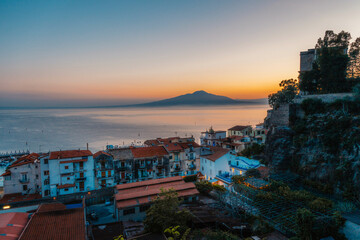 Fototapeta premium Streets in a touristic town, Sorrento near Amalfi coast, Italy. with a view of Naples and the Vesuvius volcano in the background