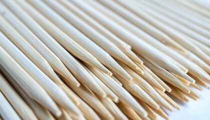 Close up shot of many wooden skewers arranged neatly together Ideal for food preparation or craft projects