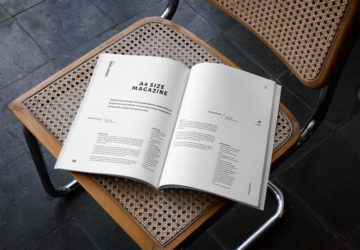 Mockup Of Customized Open A4 Magazine On Chair