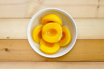 Peach halves in syrup. Fruity desserts