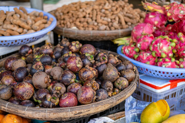 Local market with exotic fruits in Vietnam, Nha Trang resort.