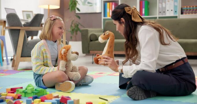 Psychology, talking or toys with therapist and child for playing games, learning development and story. Classroom, wellness therapy and fairy tale with girl, kid student or woman with stuffed animal