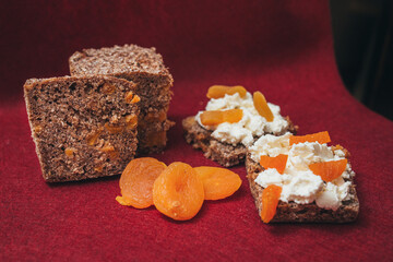Country breakfast of sandwiches on whole grain healthy bread with fresh cottage cheese and dried...