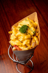 Enjoy the Delicious and Cheesy French Fries topped with a variety of flavorful toppings