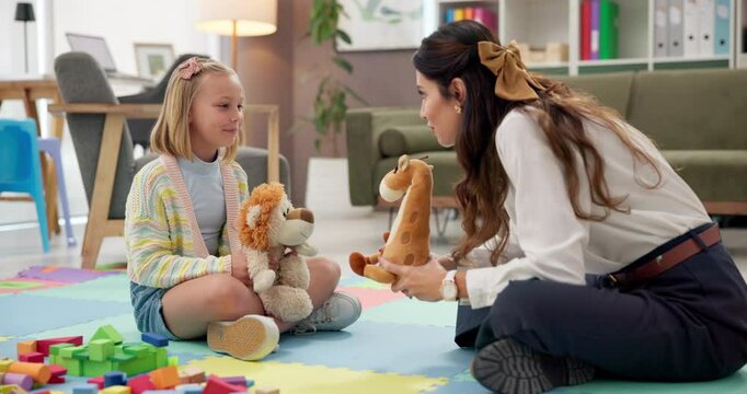 Psychology, talking or toys with woman and child for playing games, learning development or story. Classroom, wellness therapy or fairy tale with girl, kid student or psychologist with stuffed animal