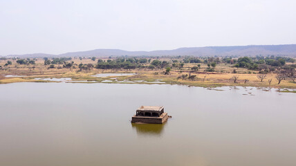 View of the 16-pillared stone pavilion in the lake at Dichpalli, a 14th-century monument of the Kakatiya Kingdom, Dichpalli, Nizamabad, Telangana, India.