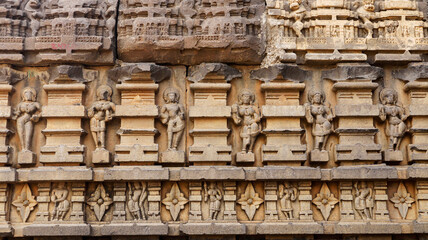 Carvings of musicians on the wall of Shri Siddheshwara Swamy Temple, Hottal, Nanded, Maharashtra, India.