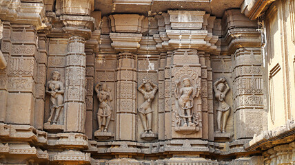 Carvings of Hindu deities and dancers on Shri Siddheshwara Swamy Temple, Hottal, Nanded, Maharashtra, India.
